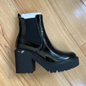 Topshop platform boot, US size 7.5, never worn.